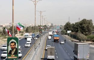  بزرگراه شهید هاشمی با ۲۱۶ پرچم، تمثال شهدا و نورپردازی ویژه آراسته شد