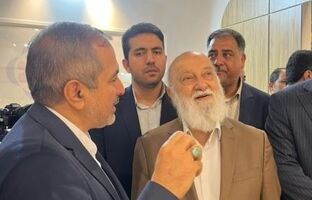  بازدید دکتر مهدی چمران، رئیس شورای اسلامی شهر تهران، از غرفه موسسه اعتباری ملل، در نمایشگاه بین‌المللی مشهد